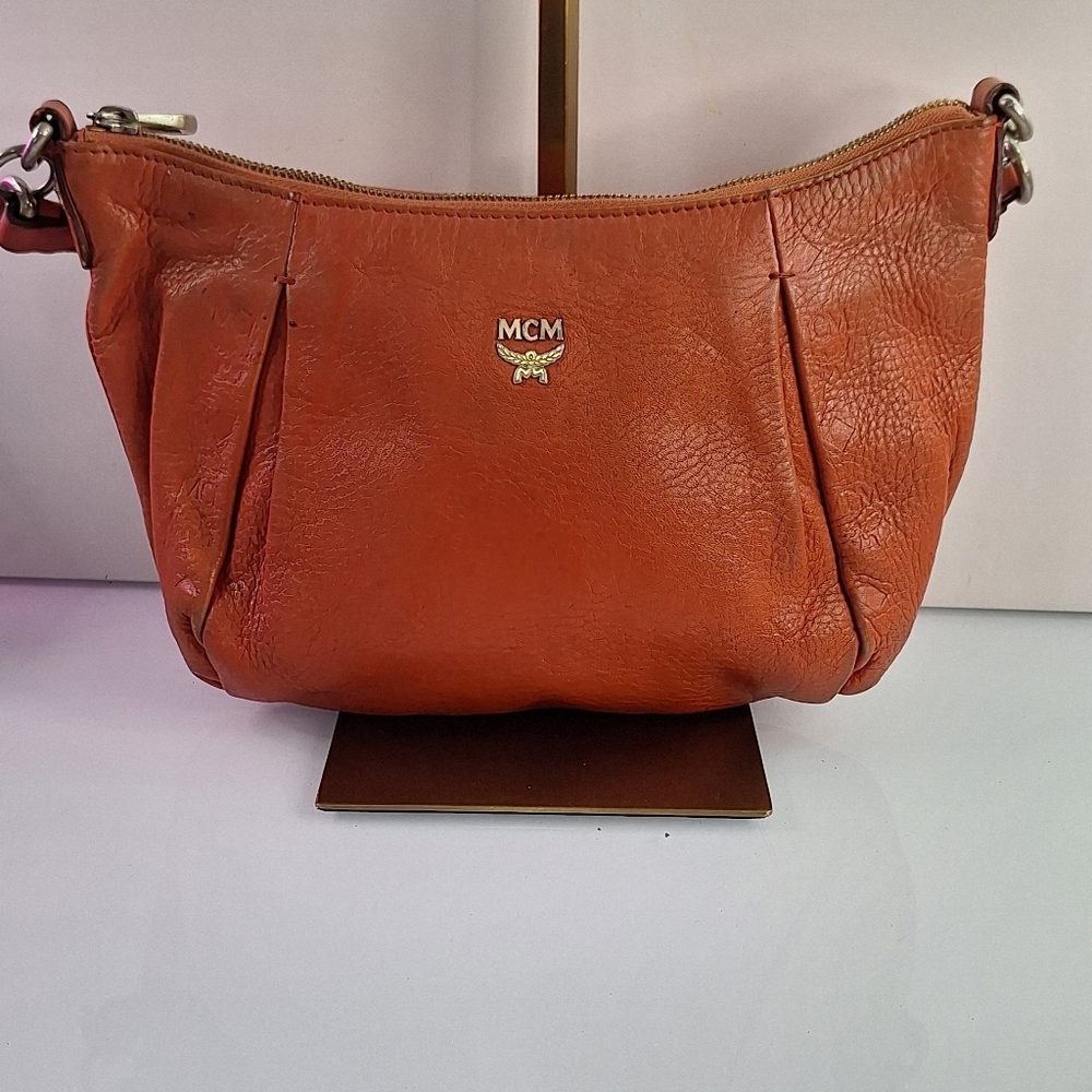 MCM Orange Leather Clutch